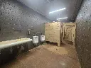 Inside Men's Bathroom- bathhouse.webp